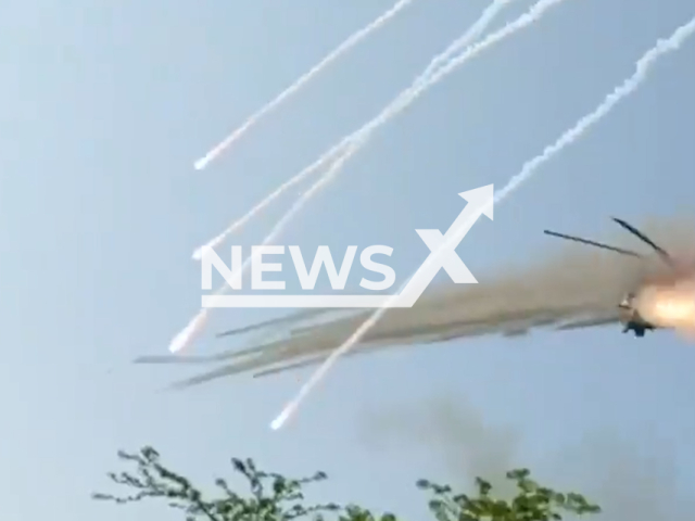 Ukrainian attack helicopters firing missiles at Russian positions in Ukraine in undated footage. The footage was released by Ground Forces of the Armed Forces of Ukraine on Thursday, June, 1, 2023. Notes: Photo is screen from a video. (@UALandForces/Newsflash)