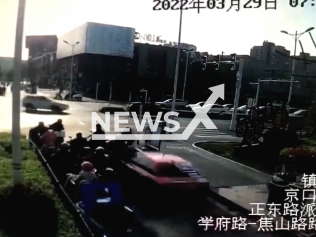 Car crashes into multiple motorbikes injuring four in Zhenjiang, China, on 29th March 2022. Note: This picture is a screenshot from the video (AsiaWire).