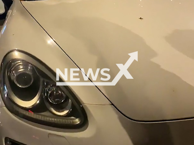 Woman covers driver's windshield with menstrual pads for blocking the road in Nanjing, China. Note: This picture is a screenshot from the video (7591514/AsiaWire).