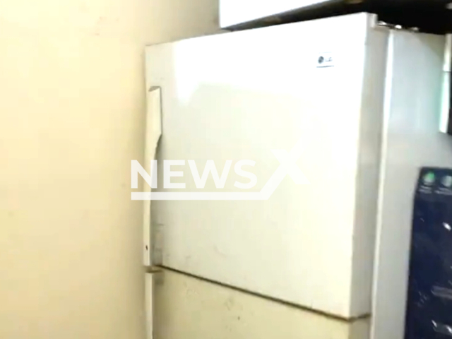 Photo shows a warehouse with a refrigerator door where a number of expatriate workers hid in Riyadh, Saudi Arabia, undated. They were referred to the competent authorities. Note: Picture is a screenshot from a video (The Saudi Ministry of Commerce/Newsflash)