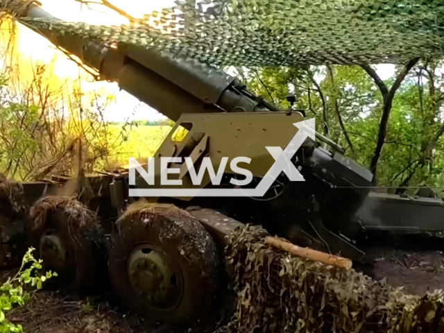 Russian artillery fire with Giacint-B howitzers at the Ukrainian military positions in Ukraine in undated footage. The footage was released by the Russian MoD on Tuesday, Jun. 6, 2023.
Notes: Photo is screen from a video. (Ministry of Defense of Russia/Newsflash)