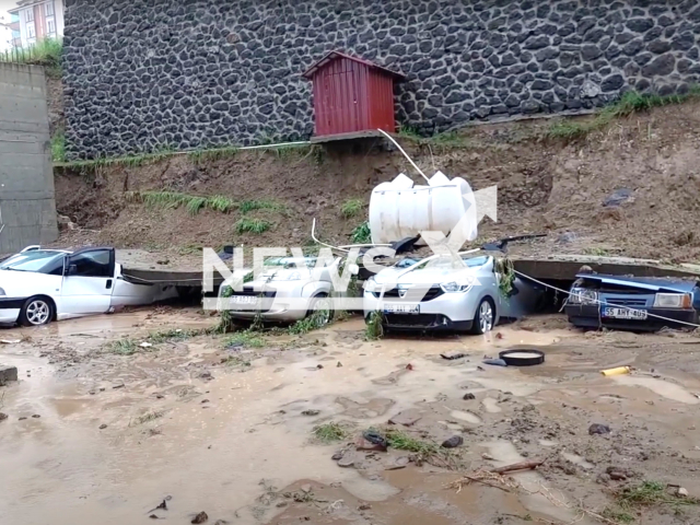 Photo shows the scene after a wall collapsed on cars due to the high pressure of flood waters in Canik, Samsun, Turkey, Monday, June 5, 2023. Five cars were damaged due to the incident. Note: Picture is a screenshot from a video (Newsflash)