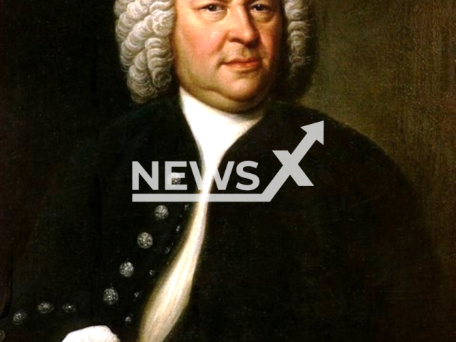 Johann Sebastian Bach (aged 61) in a portrait by Elias Gottlob Haussmann, undated photo. Bach is holding a copy of the six-part canon BWV 1076. Note: Photo is on the public domain. (Newsflash)