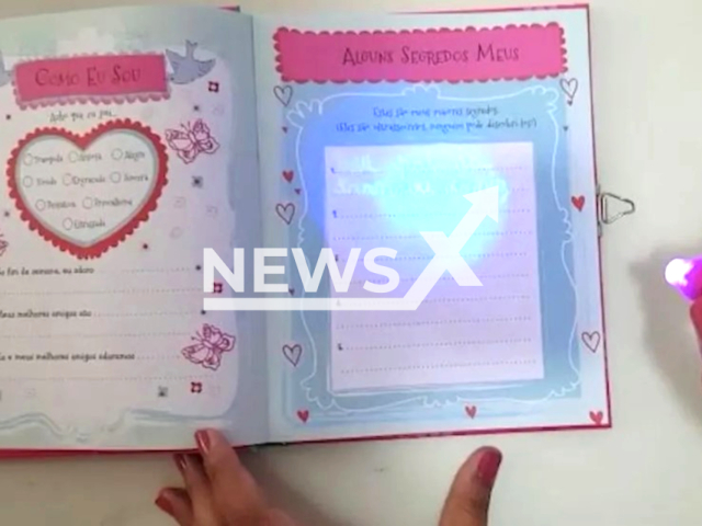 Photo shows the diary of a 9-year old girl from Vespasiano, Belo Horizonte in Minas Gerais, Brazil. She wrote with an invisible ink pen that her father abused her. 
Note: Police photo(Policia Civil Minas Gerais/Newsflash)