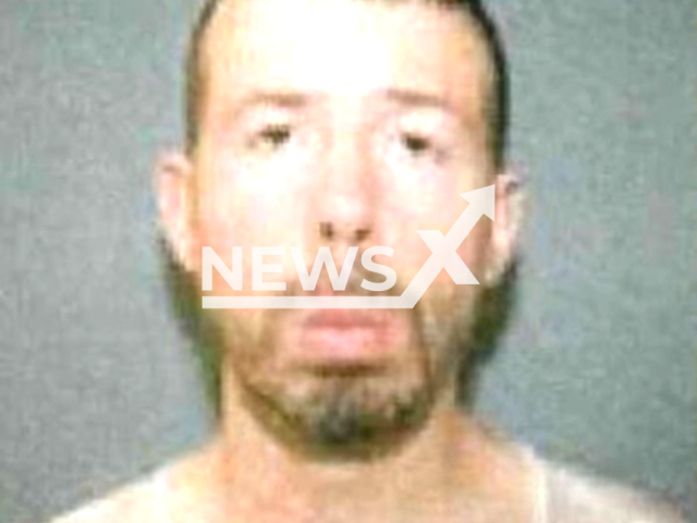 Photo shows Eric R. Meagan. He allegedly drowned his mother Victoria Palmer in Still River near Harrybrooke Park,  northwest of New Haven, Connecticut.
Note: Police photo(New Milton Police Department/Newsflash).