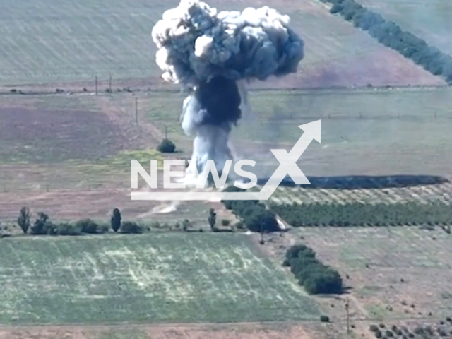 Ukrainian fighters destroy a Russian self-propelled mortar 2S9 Nona-S in a powerful explosion in Ukraine in undated footage. The footage was released by the 406th separate artillery brigade on Thursday, Jun. 8, 2023.
Notes: Photo is screen from a video. (@406oabr/Newsflash)