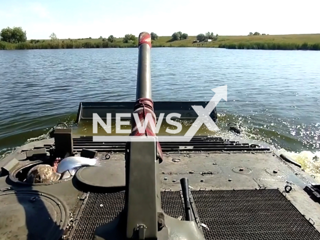 Ukrainian soldiers catch a fish on a BMP during reservoir force exercises in Ukraine in undated footage. The footage was released by the 60th separate mechanized Ingulets brigade on Thursday, Jun. 8, 2023.
Notes: Photo is screen from a video. (@60ombr/Newsflash)