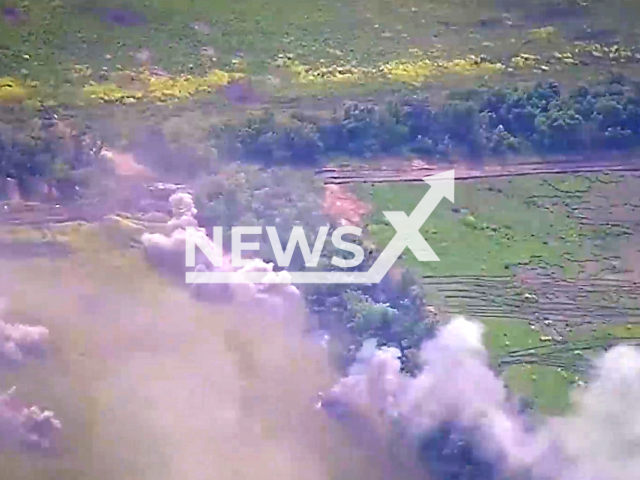 Russian military destroy Ukrainian armored vehicles in the Zaporozhye direction in Ukraine in undated footage. The footage was released by the Russian MoD on Thursday, Jun. 8, 2023.
Notes: Photo is screen from a video. (@mod_russia/Newsflash)