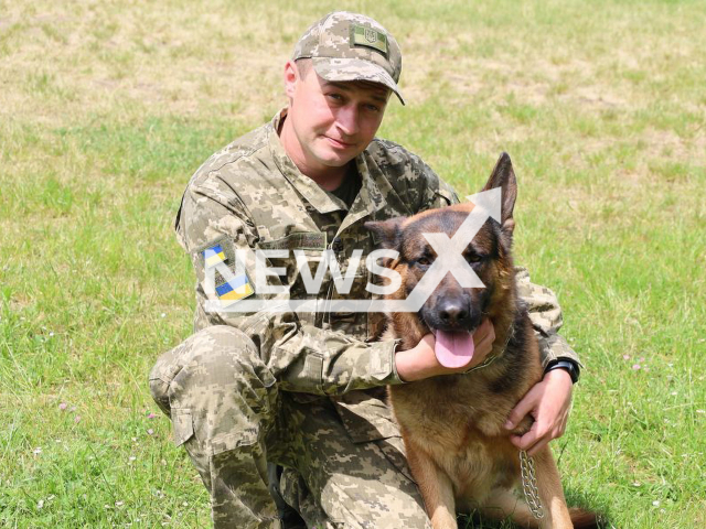 Ukrainian border guard Ihor poses with his dog Ramus in undated photo. They reunited after months of Ihor being in Russian captivity when he received gunshot and shrapnel wounds defending Azovstal. Note: Photo is obtained from the Western Regional Department of the State Border Service of Ukraine. (@zahidnuy.kordon/Newsflash)