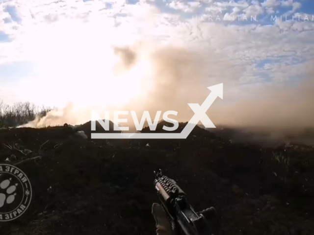 Ukrainian soldier shoots a gun at Russian positions in Ukraine in undated footage. The footage was released by the Ukrainian unit "Wolf Pack" of the 3rd separate assault brigade on Sunday, June 11, 2023. Note: This picture is a screenshot from the video. (@wolfspackgroup/Newsflash)