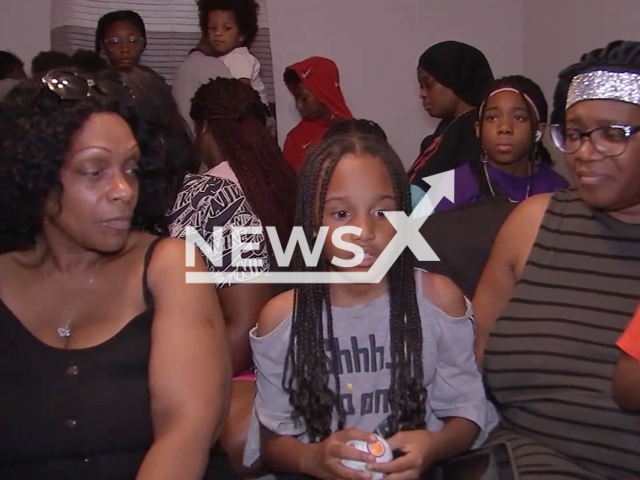 Picture shows the victims' daughter  Azariah 9, (middle) surrounded by family, undated. She witnessed Thomas Wilson Alexander, 32,   killing her mother  Jasmine McHenry, 29, in Huston Texas, USA, on Sunday , June 11, 2023. 

 Note: Photo is a screenshot from a video. (Newsflash)