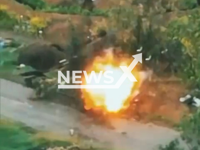 Ukrainian Kamikaze drone blows up Russian position with soldiers shooting machine gun at Ukrainian troops in Ukraine in undated footage. The footage was released by the Donetsk separate brigade of the Ukrainian Territorial Defense Forces on Friday, June 16, 2023. Note: Picture is a screenshot from a video (@donobrtro/Newsflash)