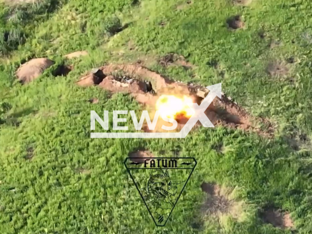 Ukrainian drone of the reconnaissance and strike unit "FATUM" of the 3rd Separate Assault Brigade blows up Russian troops inside trenches in Bakhmut, Ukraine in undated footage. The footage was released by the 3rd Separate Assault Brigade on Friday, June 16, 2023. Note: Picture is a screenshot from a video (FATUM unit/Newsflash)