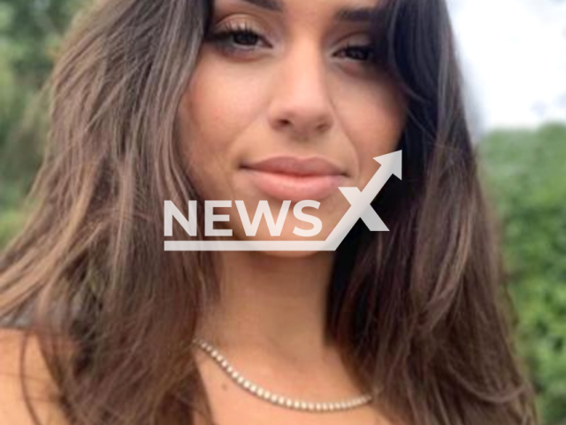 Tania Gomez, 30, poses in undated photo. She is wanted by the Europol for severe drug smuggling and money laundering. Note: Licensed content. (Europol/Newsflash)