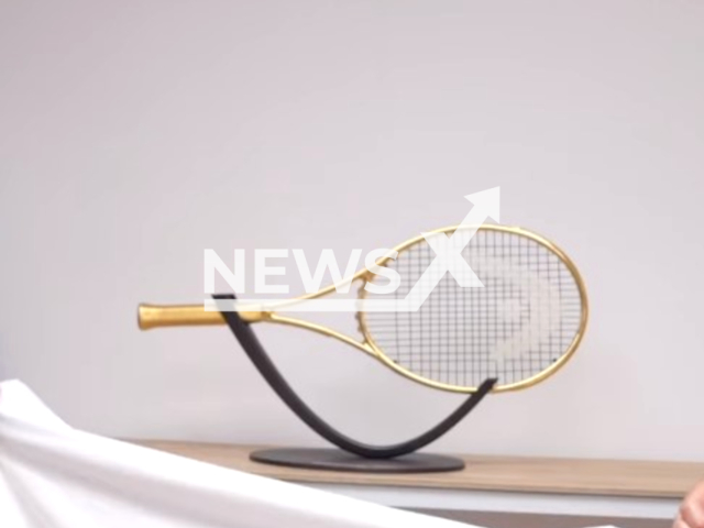 Photo shows the golden racket made for Novak Djokovic. The Serbian tennis player who won the 23th Grand Slam, got a racket weighing eight kilos. Note: Photo is a screenshot from a video(@headtennis_official/Newsflash).