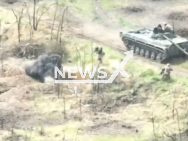 Ukrainian tankmen and infantry clear Russian positions after this in Ukraine in undated footage. The footage was released by the 128th Mountain Assault Brigade "Zakarpattia" on Friday, June 23, 2023. Note: Picture is a screenshot from a video (@brigade128/Newsflash)