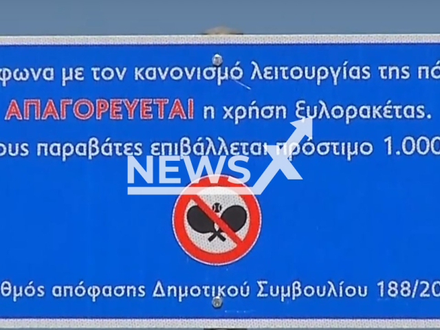 Photo shows a sign for ban of using rackets on some beaches in Greece. Offenders are asked to pay fines.
Note: Photo is a screenshot from a video(Newsflash).