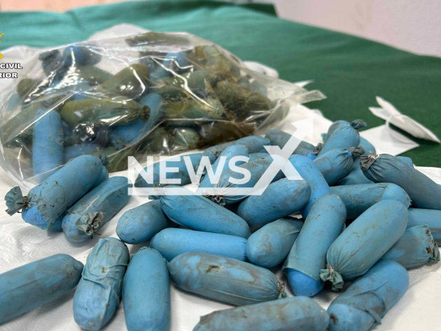 Picture shows the drugs seized by police, undated. Two people were arrested after  they  left a drug mule that ingested 93 high-purity cocaine capsules weighing 1,200 grams in front of a hospital before he died, in La Rioja, Spain, on April 24, 2023. Note: Police photo. (Newsflash)