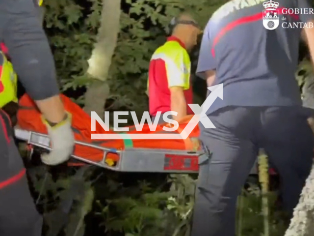 Photo shows the rescue of the British hiker in Cantabria, Spain. The woman, 64, got lost twice within a space of 24 hours.
Note: Photo is a screenshot from a video(@112Cantabria/Newsflash).