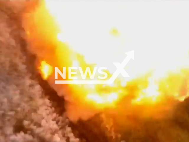 Ukrainian drone's precision strike decimates Russian anti-tank mines storage in massive explosion in Ukraine in undated footage. The footage was released by the 102nd separate brigade of the Territorial Defense Forces on Thursday, Jun. 29, 2023.
Notes: Photo is screen from a video (@102brygadaTROIvanoFrankivsk/Newsflash)