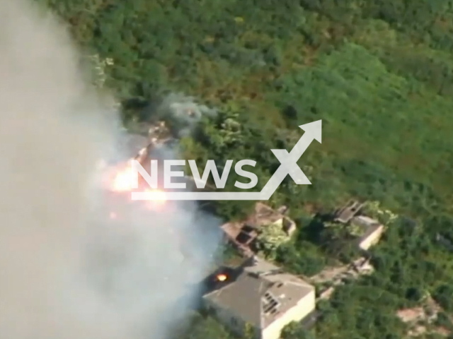 Ukrainian forces destroy Russian BM-21 'Grad' using AHS Krab tracked self-propelled gun-howitzer near Bakhmut n Ukraine in undated footage. The footage was released by 26th Artillery Brigade on Wednesday, Jul. 05, 2023.
Notes: Photo is screen from a video. (@26abr/Newsflash)