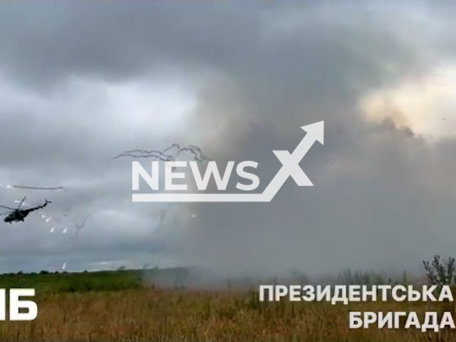 Ukrainian helicopter fire missiles at Russian military position near Avdiivka in Ukraine in undated footage. The footage was released by Separate presidential brigade on Thursday, Jul. 06, 2023.
Notes: Photo is screen from a video. (@Prezydentska.Bryhada/Newsflash)