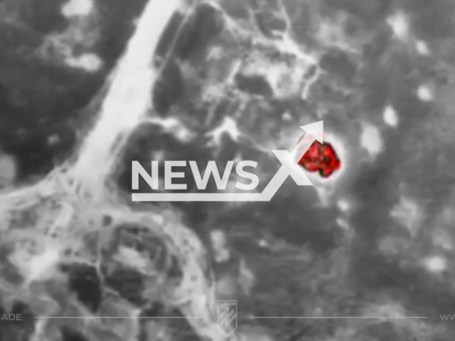 Azov fighters neutralize a Russian dugout using precise bomb strikes delivered by a drone in the war zone in Southern Ukraine in undated footage. The footage was released by "Azov" brigade on Tuesday, Jul. 04, 2023.
Notes: Photo is screen from a video. (@azov_media/Newsflash)