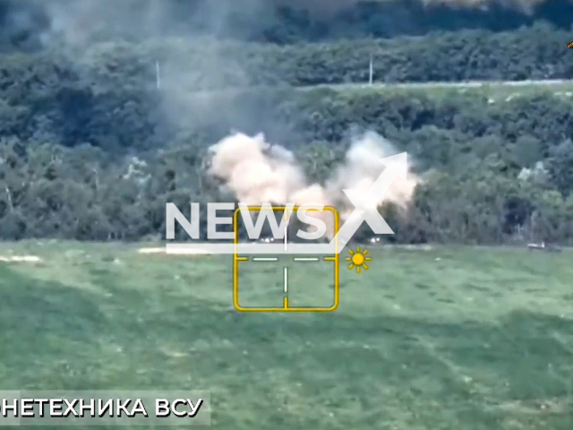 Russian artillery destroys Ukrainian armuored vehicles on the frontline in Ukraine in undated footage. The footage was released by People's Militia of the DPR on Tuesday, Jul. 11, 2023.
Notes: Photo is screen from a video. (@nm_dnr/Newsflash)