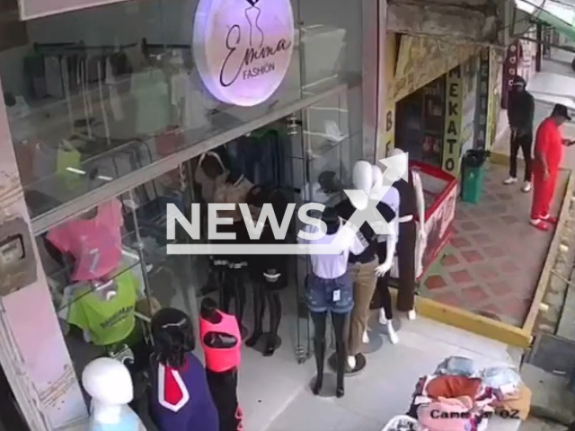 A hitman tries to kill a man, but the gun fails twice in Antioquia, Colombia, undated. The man who was tried to be killed did not notice anything as he was looking at his phone. Note: Picture is a screenshot from a video (Newsflash)