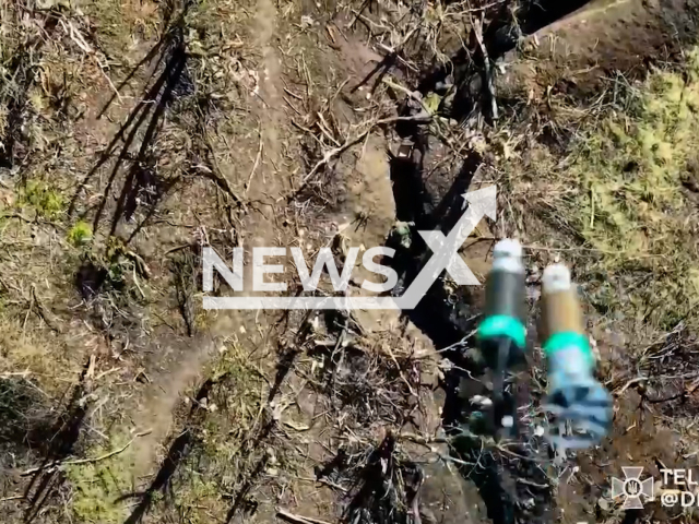 The drones from Ukrainian border guards drop bombs at Russian military positions in the trenches near Lyman in Ukraine in undated footage. The footage was released by State Border Service of Ukraine on Thursday, Jul. 13, 2023.
Notes: Photo is screen from a video. (@DPSUkr/Newsflash)