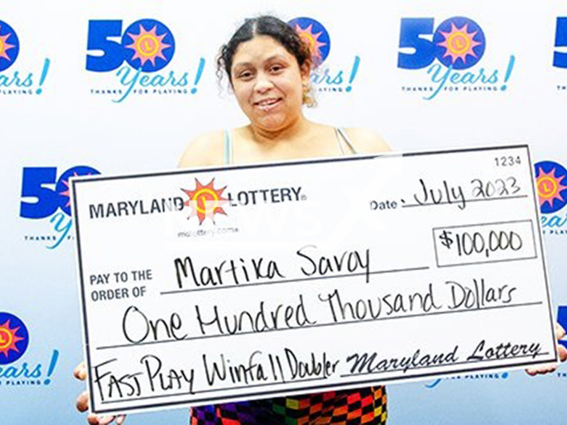 Martika Savoy poses in undated photo. She won $100,000 on FAST PLAY Winfall Doubler. Note: Lottery photo. (Maryland Lottery/Newsflash)