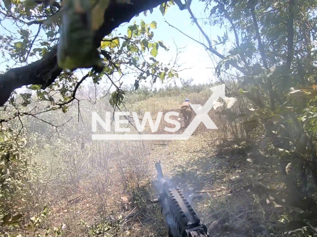 Ukrainian troops engage in close combat, utilizing machine guns and grenade launchers, against Russian forces on the battlefield in Ukraine in undated footage. The footage was released by Ground Forces of the Armed Forces of Ukraine on Monday, Jul. 17, 2023.
Notes: Photo is screen from a video. (@28mechanizedbrigade/Newsflash)