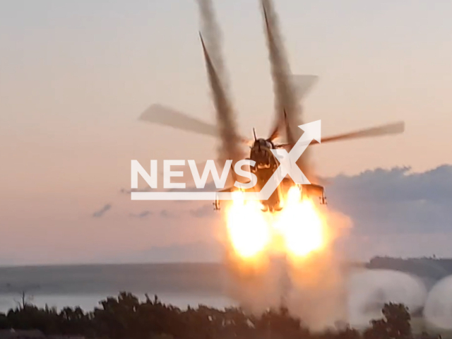 Ukrainian attack helicopter launches missiles at Russian military targets in Ukraine in undated footage. The footage was released by the 12th separate brigade of army aviation on Tuesday, Jul. 18, 2023.
Notes: Photo is screen from a video. (@12o.br.AA/Newsflash)