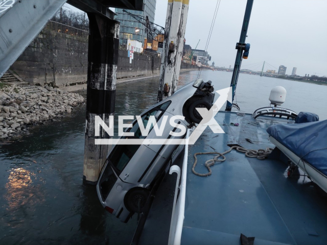 Minivan gets stuck on ferry  and hangs over Rhine River on 4th of April 2022 in Cologne.
Note: Police photo(Polizeiprasidium Koln/Newsflash).