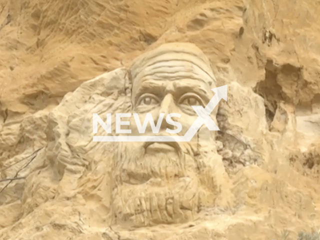 Photo shows a face figure carved on the rocks at the Rompeculos beach in Huelva, Spain, undated. It is unknown when it was created. Note: Picture is a screenshot from a video (Newsflash)