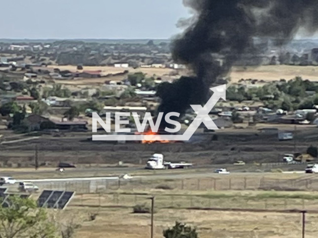 Photo shows the small plane that crashed into a New Mexico home on Tuesday, July 18, 2023.  The pilot died and the house is destroyed by a fire. Note: Police photo(@NMStatePolice/Newsflash).