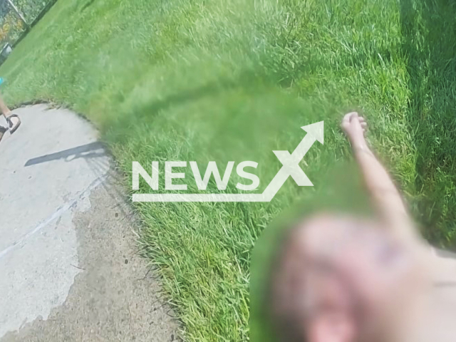 Photo shows the 2-year old child that was  found lifeless at the bottom of a pool in Sterling Height. Police officer rescued the toddler. 
Note: Photo is a screenshot from a video(Sterling Heights Police Department/Newsflash).