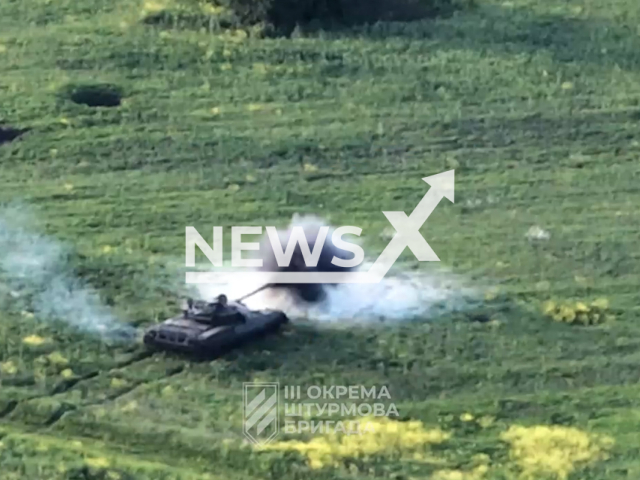 Ukrainian tank fire at Russian military positions near Bakhmut in Ukraine in undated footage. The footage was released by 3rd separate assault brigade on Wednesday, Jul. 19, 2023.
Notes: Photo is screen from a video. (@ab3army/Newsflash)