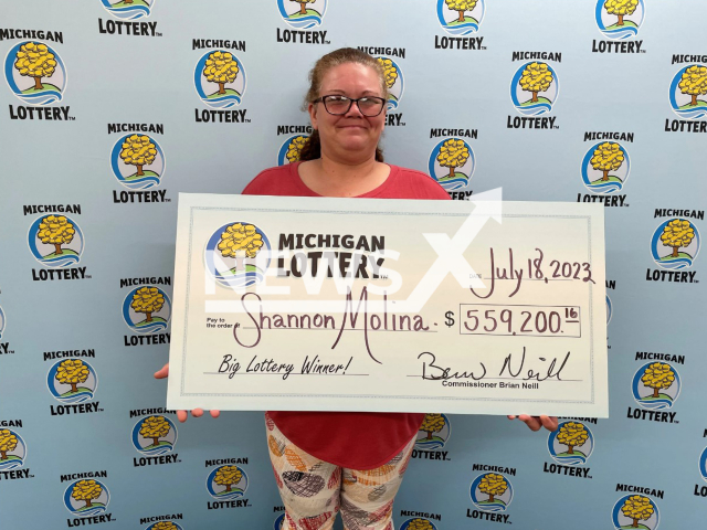 Shannon Molina, 47, from Waterford, Michigan, poses in undated photo. The lucky woman won $559,200 Monthly Jackpot Progressive prize from the Michigan Lottery.
Note: Licensed photo(Michigan Lottery/Newsflash).