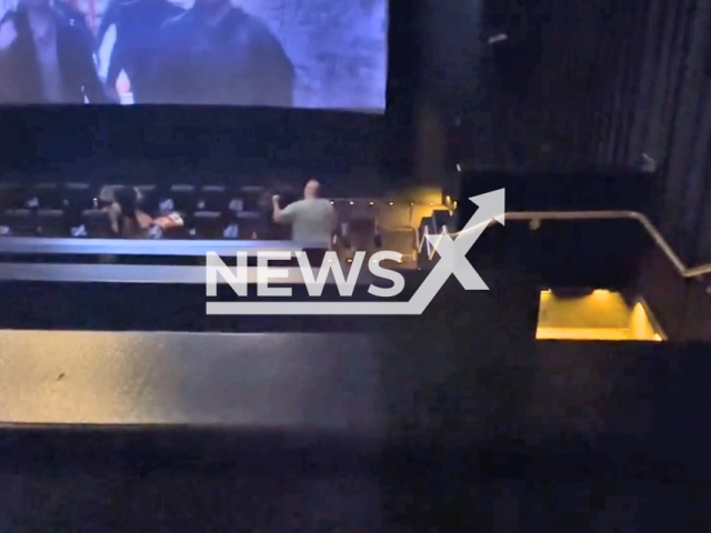 A man  beats  the 63-year-old victim, at a theatre in in Pompano Beach, Florida, USA, on Monday, July 10, 2023. The suspect was siting in the victim's VIP seats and there was an argument that led to the attack. Note: Picture is a screenshot from a video (	Broward Sheriff’s Office/Newsflash)