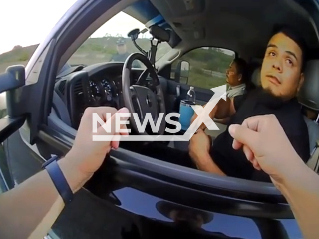 DPS trooper recovers two Children from human smuggler during traffic stop in Kinney County, Texas, United States on the 20 July, 2023. Note: Picture is a screenshot from a video (Texas Department of Public Safety/Clipzilla)