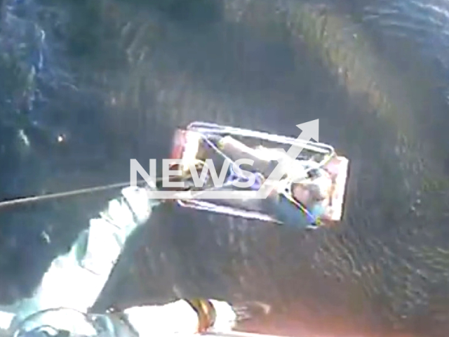 A Coast Guard Air Station Savannah aircrew rescued two men after their 16-foot boat capsized 4 miles east of Jekyll Island, Georgia, United States on 23 July 2023. Note: Picture is a screenshot from a video (United States Coast Guard/Clipzilla)