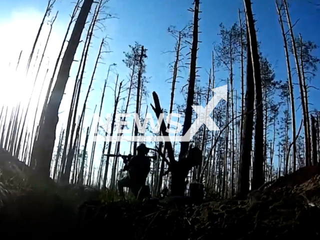 Ukrainian fighter fire with a grenade launcher at the Russian military positions straight from the trench in the Luhansk region in Ukraine in undated footage. The footage was released by the 14th separate mechanized brigade on Wednesday, Jul. 26, 2023.
Notes: Photo is screen from a video. (@ngu_war_for_peace/Newsflash)