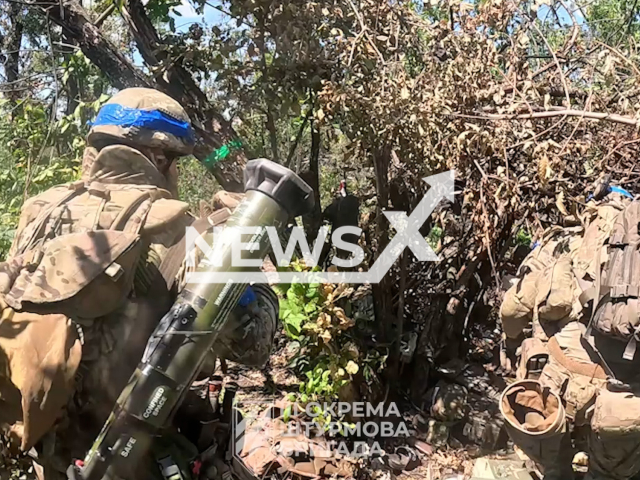 Ukrainian Stormtroopers advance and liberate new positions previously held by the Russian military near Bakhmut in Ukraine in undated footage. The footage was released by the 3rd separate assault brigade on Wednesday, Jul. 26, 2023.
Notes: Photo is screen from a video. (@ab3army/Newsflash)