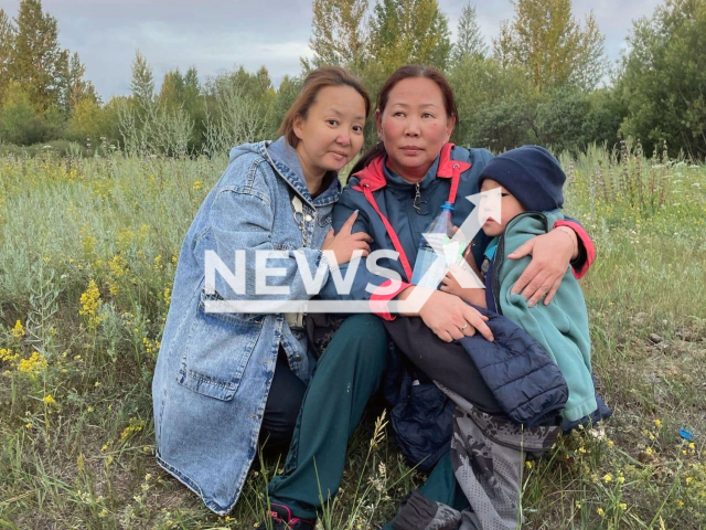 Photo shows a four-year-old boy with his family after he was found alive in Chadan, Tuva, Russia, Thursday, July 27, 2023. The boy went missing in the forest on July 25, 2023. Note: Licensed photo (@khovalyg_live/Newsflash)