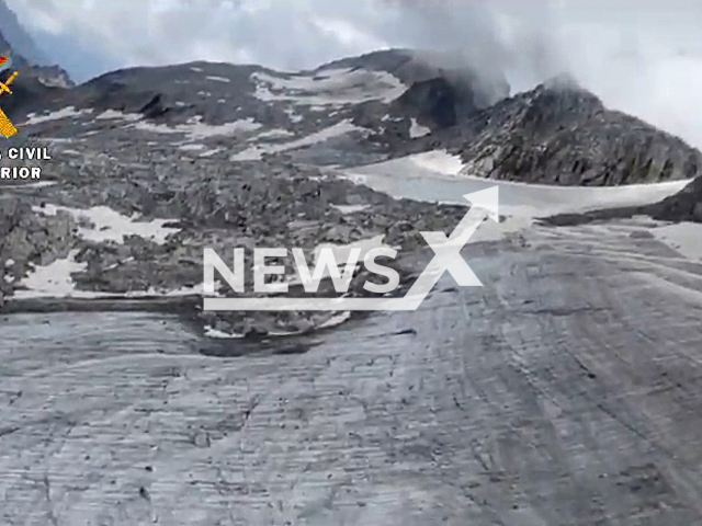 Members of the Spanish Civil Guard check the glacier of Aneto, in the Pyrenees. Alert has been set for hikers due to the bad conditions of the glacier due to heat waves lived in the country. Note: Picture is a screenshot from a video (Newsflash)