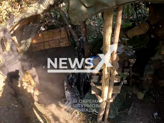 Ukrainian fighters clear the Russian bunkers in the forest battle near Bakhmut in Ukraine in undated footage. The footage was released by the 3rd separate assault brigade on Friday, Jul. 28, 2023.
 Notes: Photo is screen from a video. (@ab3army/Newsflash)