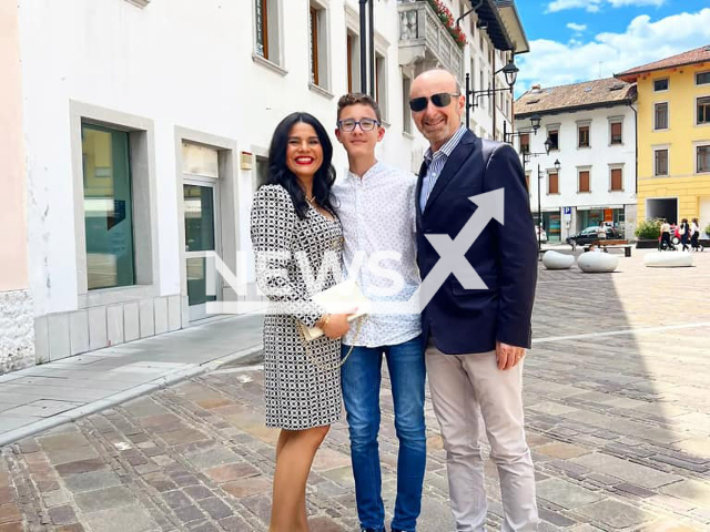 Matteo Chieu, 14,  poses with mom Denise  and father Roberto, undated. He died from complications after being bitten by a mosquito, on a trip to his mothers' native country Brazil, on Friday, July 28, 2023. Note: Private photo (Newsflash)