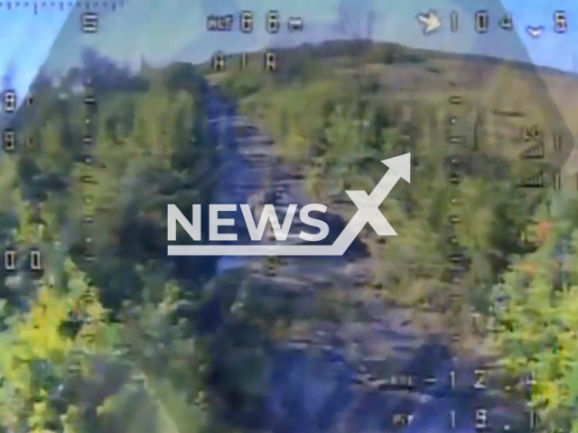 Ukrainian kamikaze drone destroys Russian armuored vehicle on the frontlines in Ukraine in undated footage. The footage was released by the Security Service of Ukraine on Sunday, Jul. 30, 2023.
Notes: Photo is screen from a video. (@110separatebrigade/Newsflash)