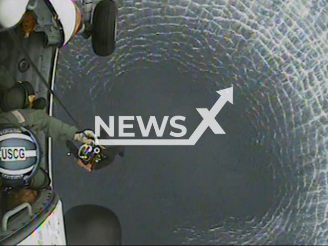 A Coast Guard helicopter aircrew rescues nine adults after their 47-foot fishing vessel runs aground near the San Clemente Island shoreline part of Channel Islands of California, United States on 29 July 2023. Note: This picture is a screenshot from the video. (U.S. Coast Guard/Clipzilla)